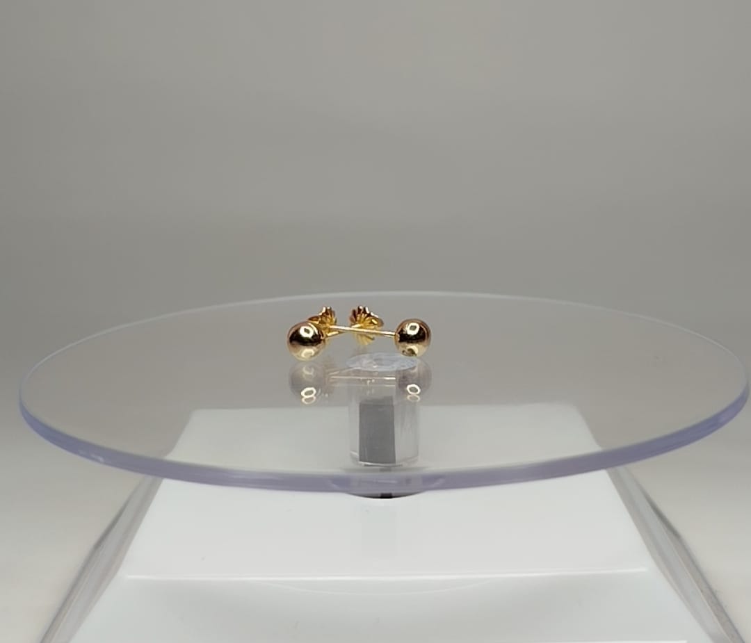 Aros bolitas en oro 18k