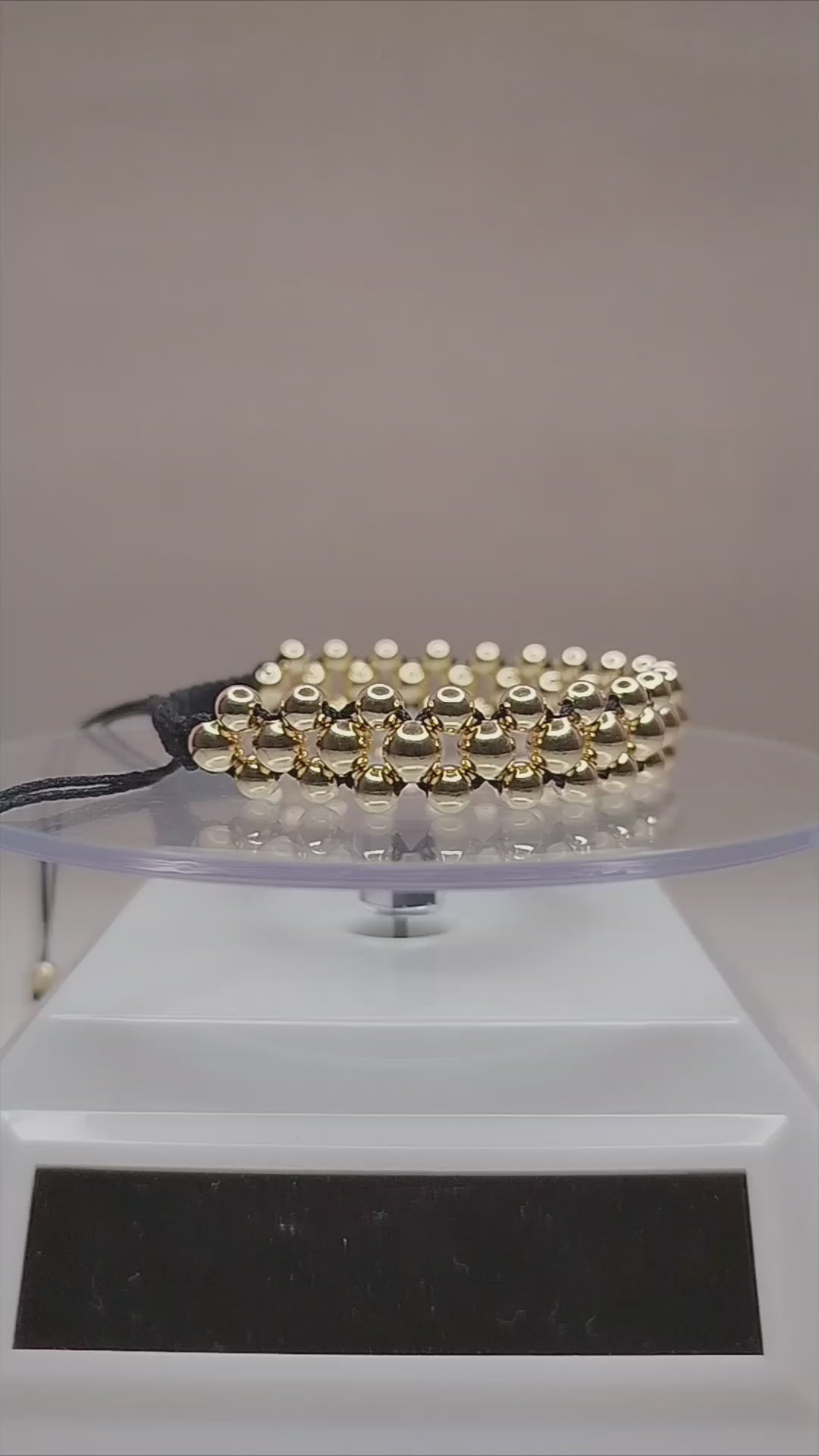 Pulsera hilo negro con balines de oro 18k ajustable hombre