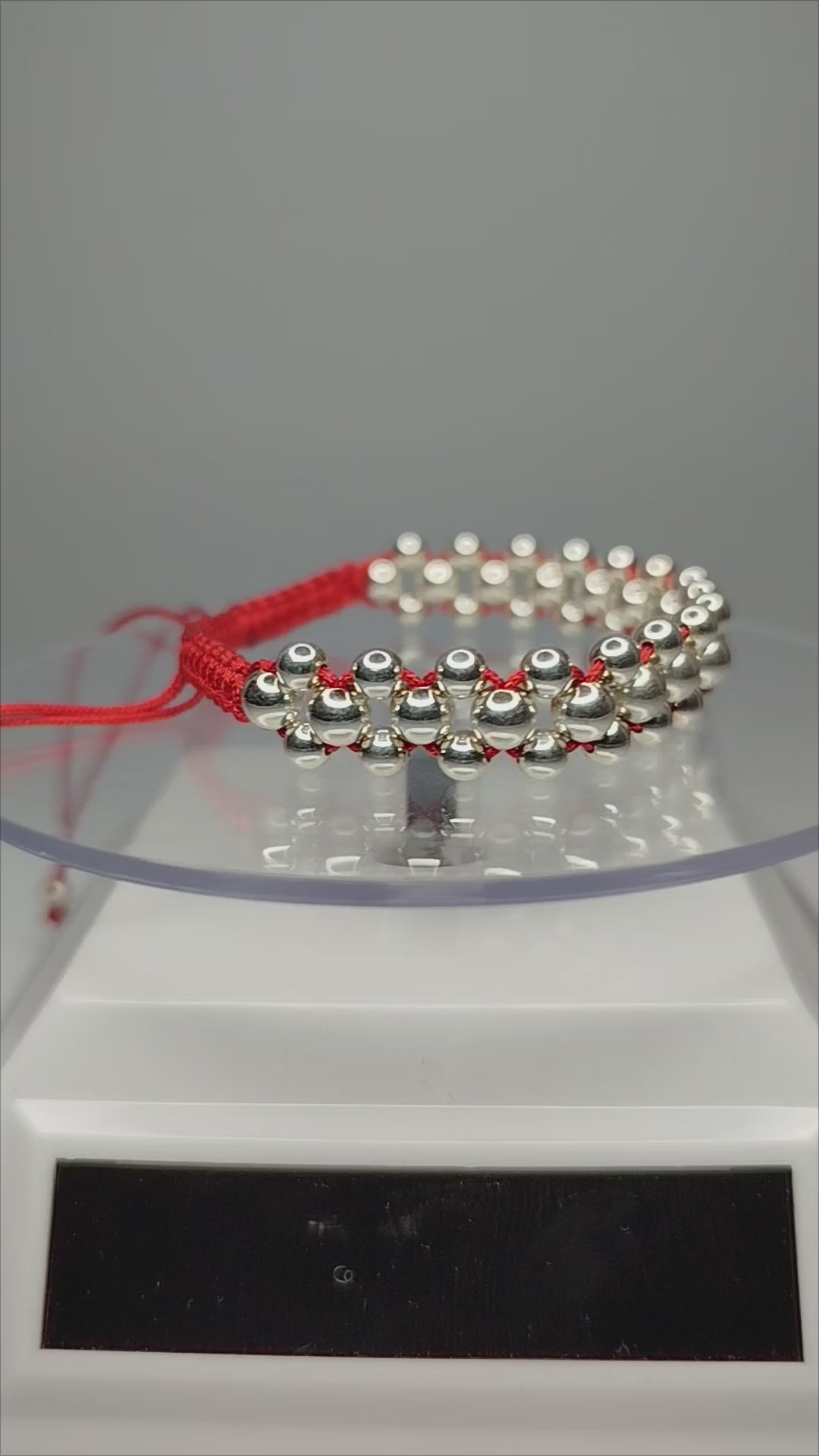 Pulsera hilo rojo con 51 balines de plata 950 ajustable hombre