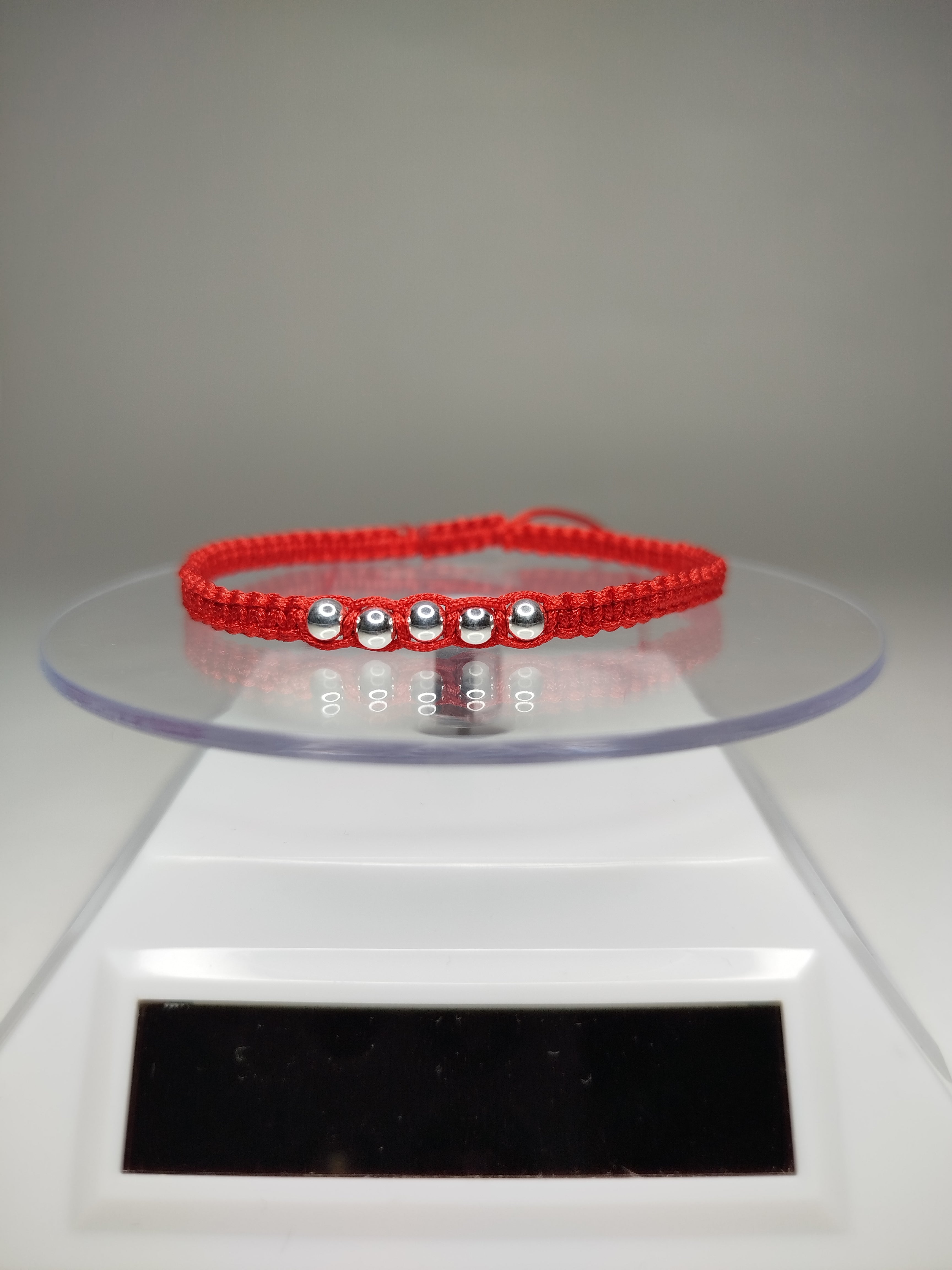 Pulsera hilo rojo con 7 balines de plata 950 ajustable mujer
