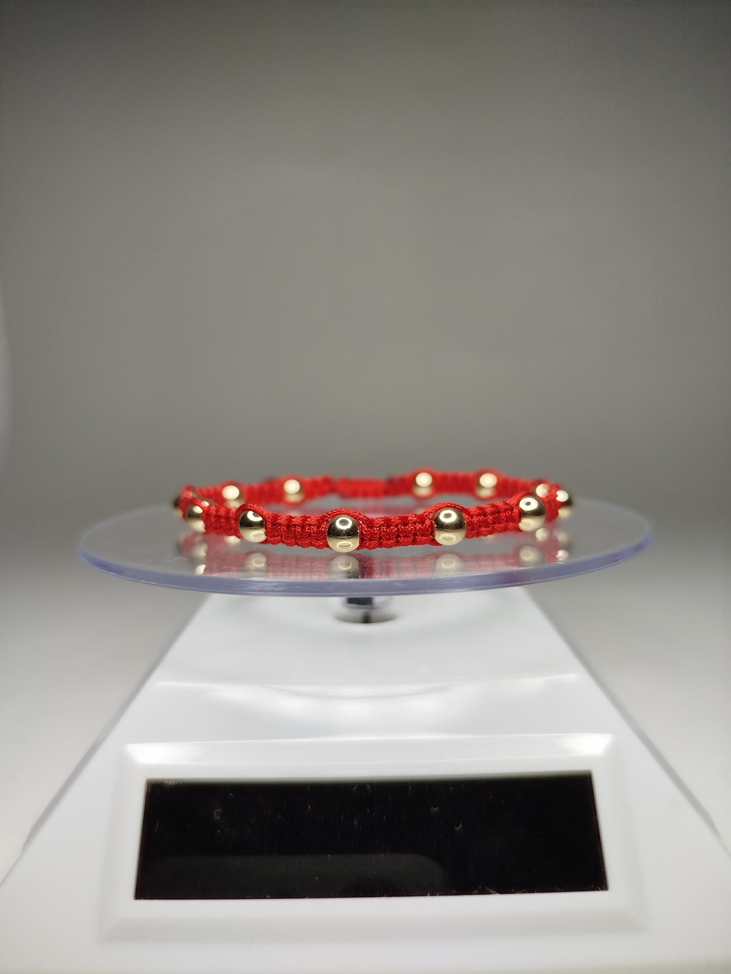 Pulsera hilo rojo con 14 balines de oro 18k ajustable hombre