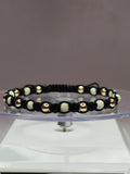 Pulsera hilo negro hombre con balines de plata 950 y oro 18k ajustable mujer
