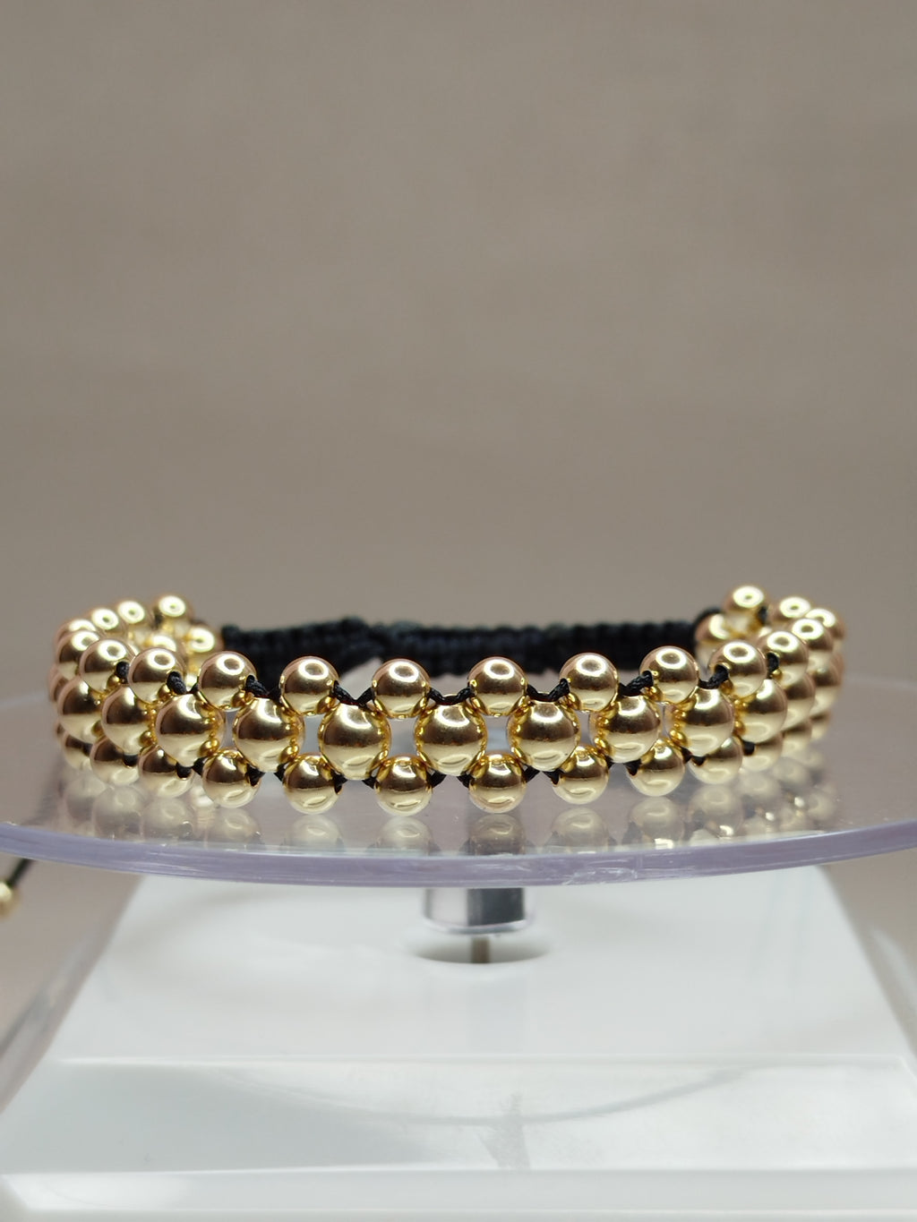 Pulsera hilo negro con balines de oro 18k ajustable hombre